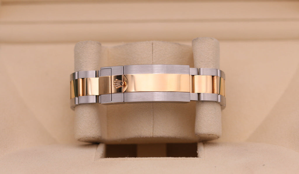 ROLEX SUBMARINER BLACK AND GOLD